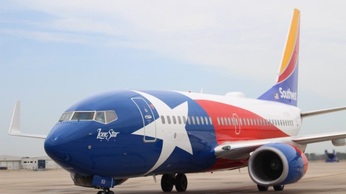 The newly repainted Lone Star One lands at Dallas Love Field on