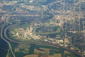 City of Omaha and Epply Airfield, with the Missouri River forming the border between Iowa (on the left) and Nebraska (on the right). Council Bluffs, IA on the upper left corner. Taken from an altitude of 36,000 feet, looking south.