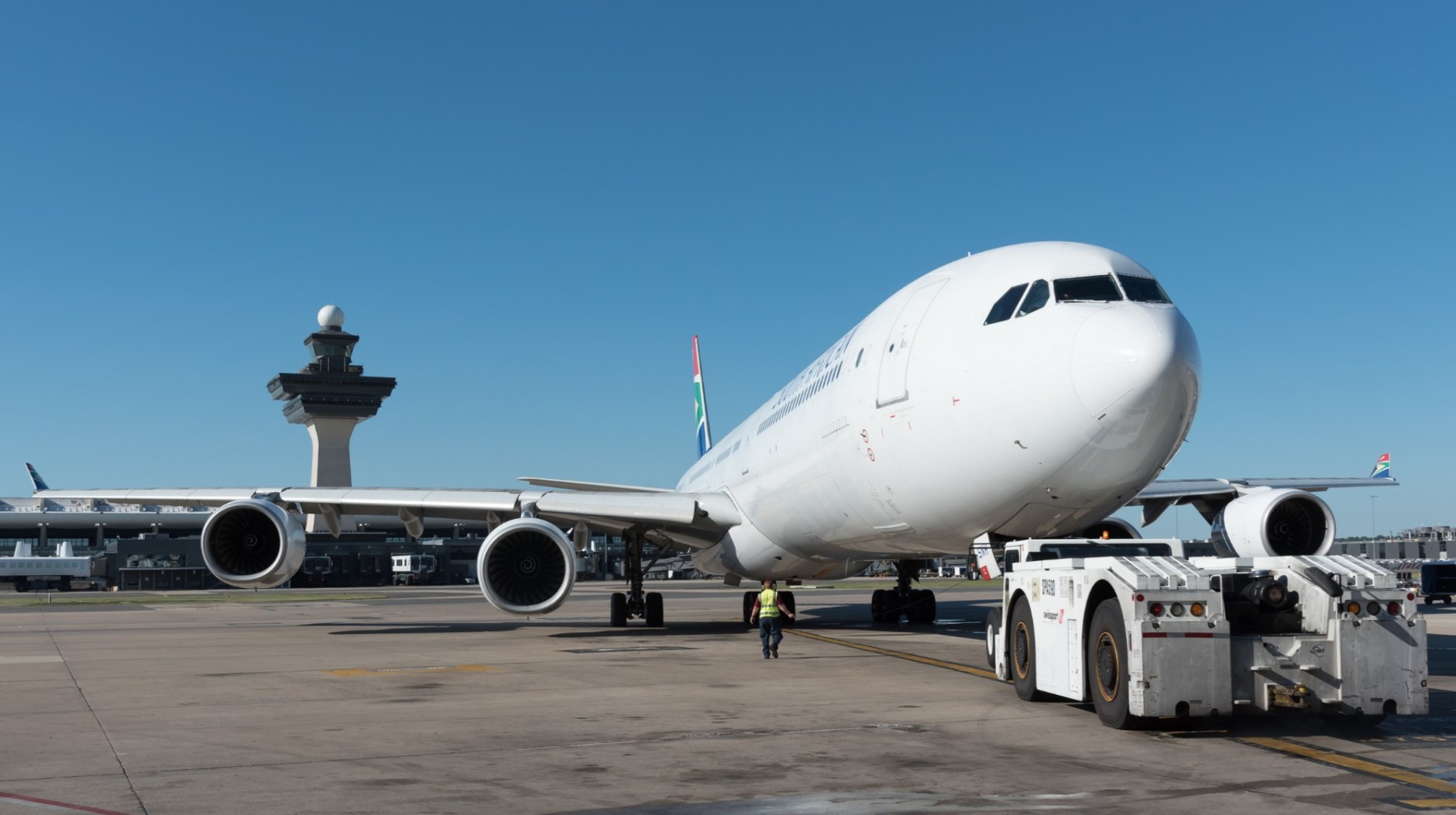 A South African Airways A340 pushing back at Washington Dulles