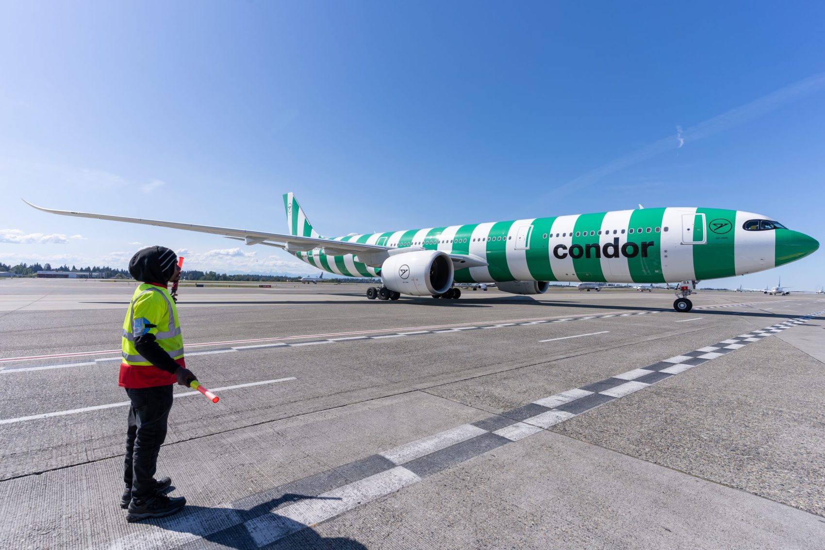 A Condor Airlines Airbus A330-900 arriving at the gate at Seattle-Tacoma International Airport.