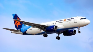 An Israir Airbus A320 registered as 4X-ABG seen landing at Tel Aviv Ben Gurion Airport.